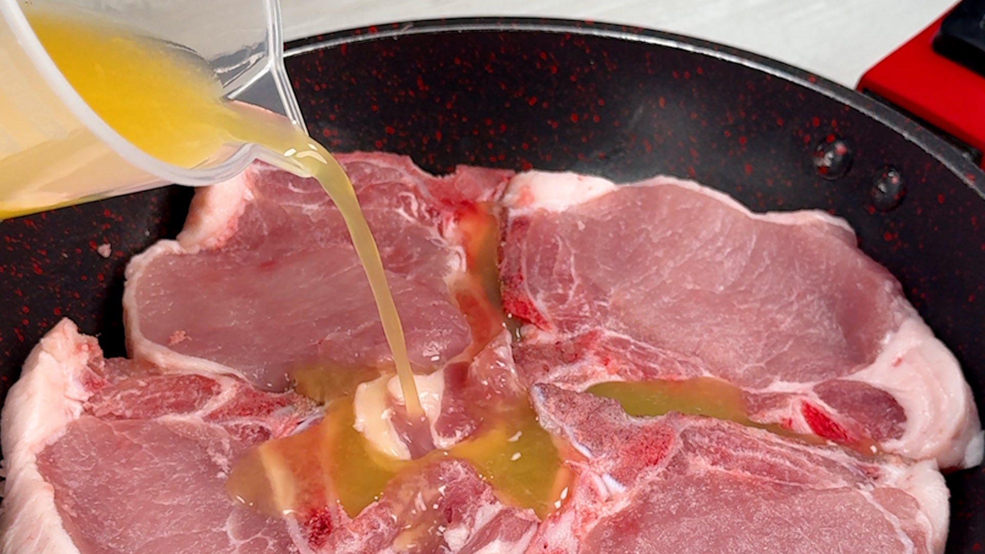 Carne de porco ao molho de laranja